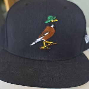 New Era Stussy Kicks/HI Navy Hat with Embroidered Brown Bird Wearing Green Cap
